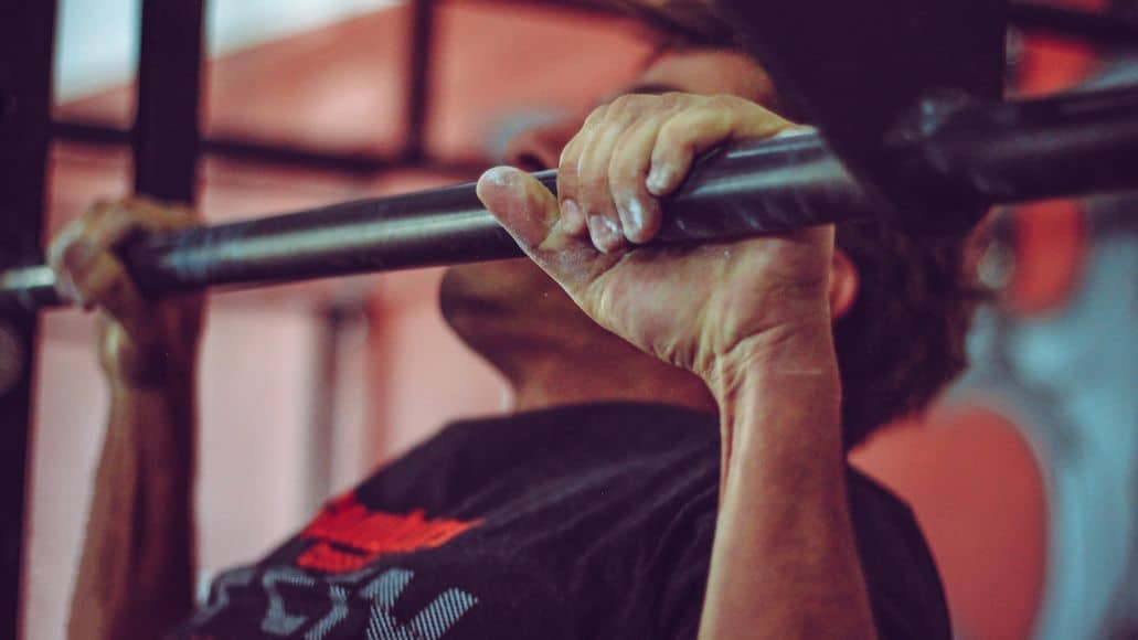 A man doing pull-ups