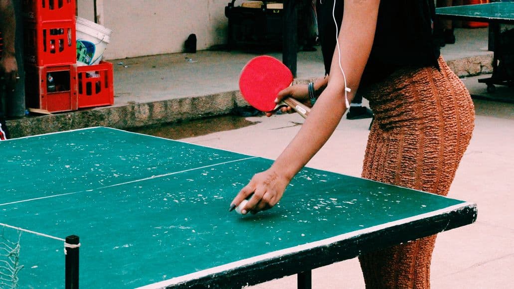 Woman playing ping pong