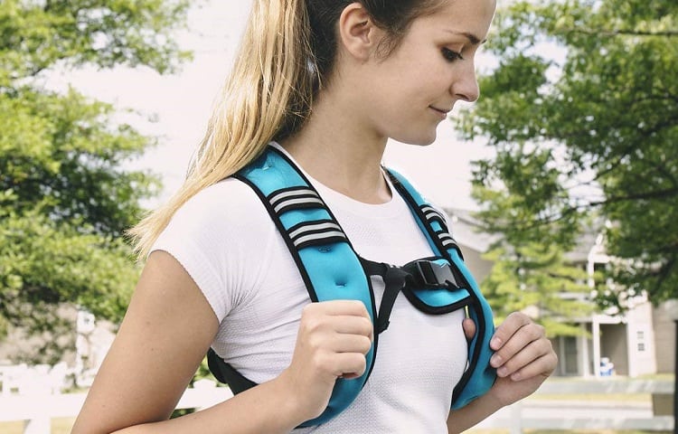 fit girl with weighted vest