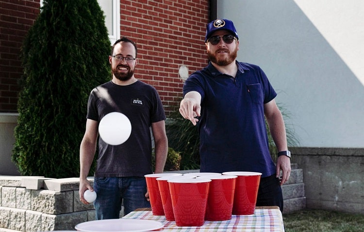 playing beer pong