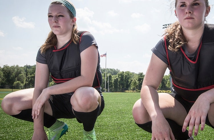 female soccer players with weighted vests