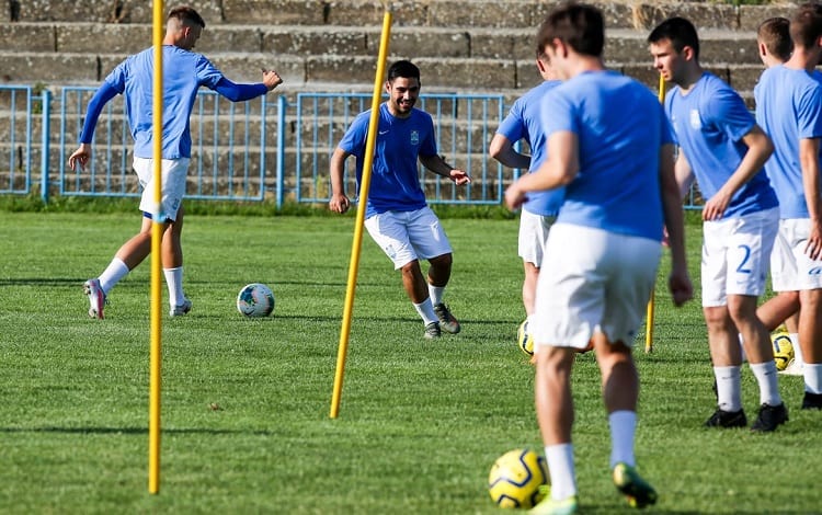 soccer training with ball and field markers